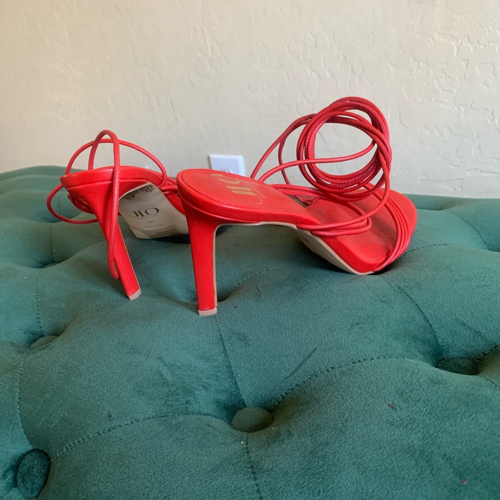 Strapped red heels